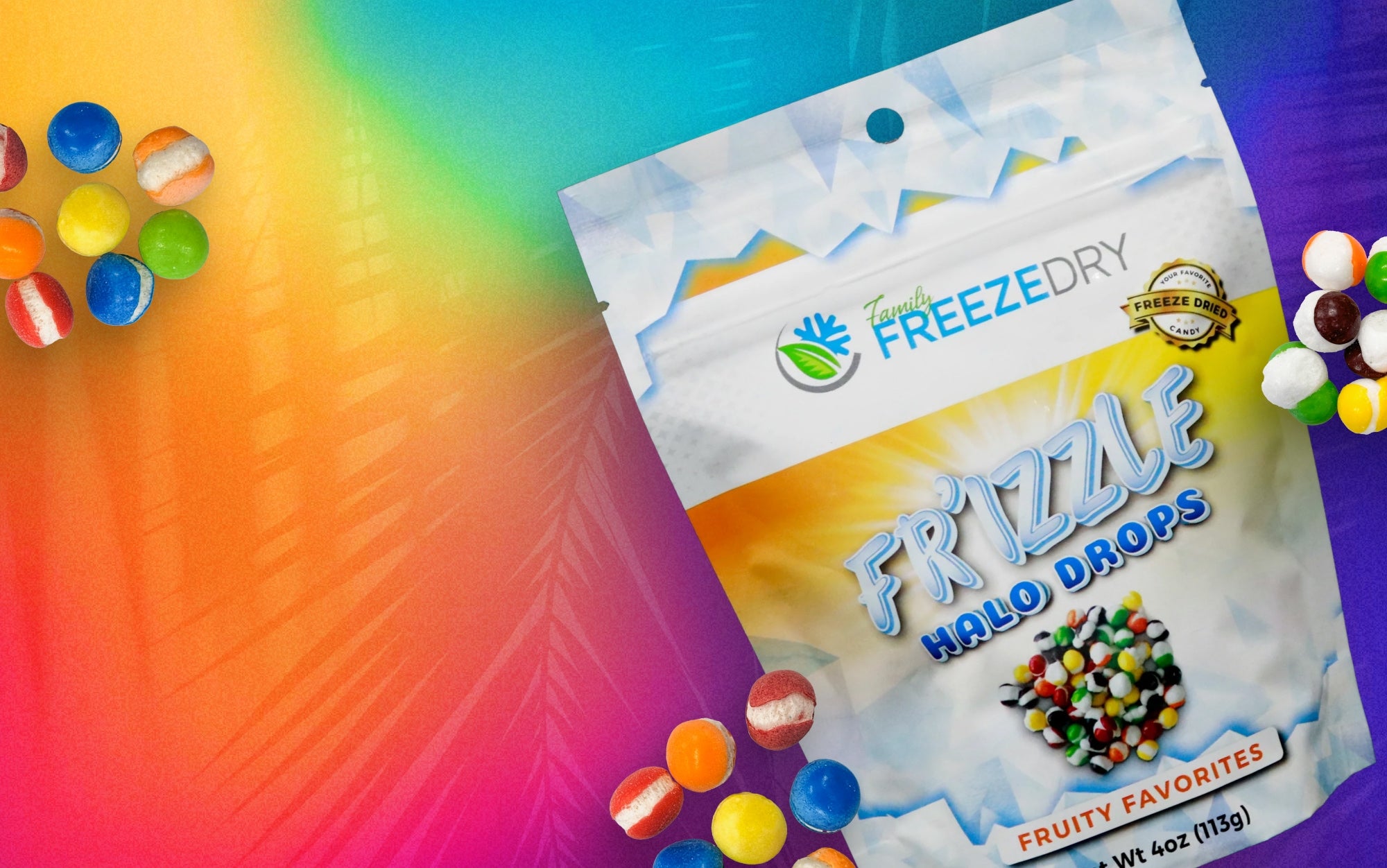 Blue, Yellow, orange, green, purple and pink background with freeze dried Original Skittles, now Halo Drops Fruity Favorites Desptop
