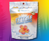 These freeze-dried Peach Rings explode with juicy peach flavor and a satisfying crunch—shown on a fun, colorful backdrop.